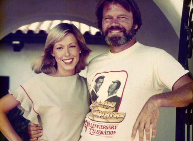 Kim-and-Glen-Campbell-courtesy-of-CareLiving.org2 A man and woman posing for the camera.